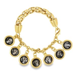 Yellow gold bracelet with 7 silver coin charms.