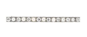 Platinum Art Deco vintage bar pin with 8 old European cut diamonds & 7 natural pearls.