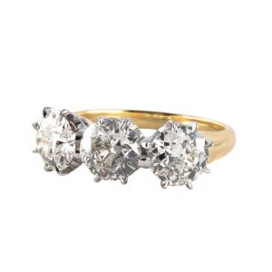 PLATINUM & 18K YELLOW GOLD VINTAGE 3 DIAMOND RING