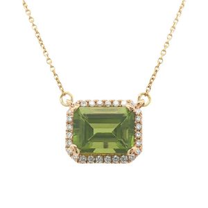 14K yellow gold pendant with emerald cut peridot surrounded by diamonds.