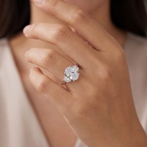 Oval center with half-moon sides Argo & Lehne engagement style ring design