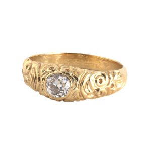 14 Karat yellow gold vintage carved ring bezel set with one approximately .43 carat early old European cut diamond. 
