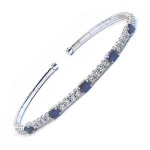 Oval sapphires & round diamonds in a 18K white gold flexible bracelet.