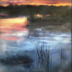 REEDS AND REFLECTIONS AT SUNSET